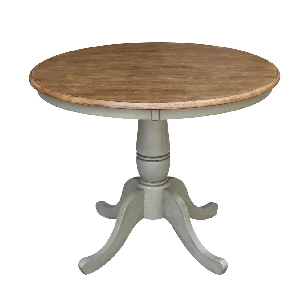36" Round Top Pedestal Table - Dining Height - Distressed Hickory/Stone Finish. Picture 1