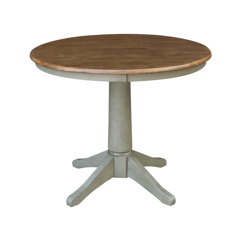 36" Round Top Pedestal Table - Dining Height - Distressed Hickory/Stone Finish. Picture 1