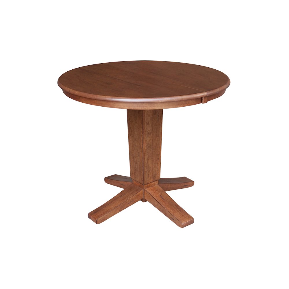 36 in Round Top Pedestal Dining Table with 12 in Leaf in Distressed Oak. Picture 1