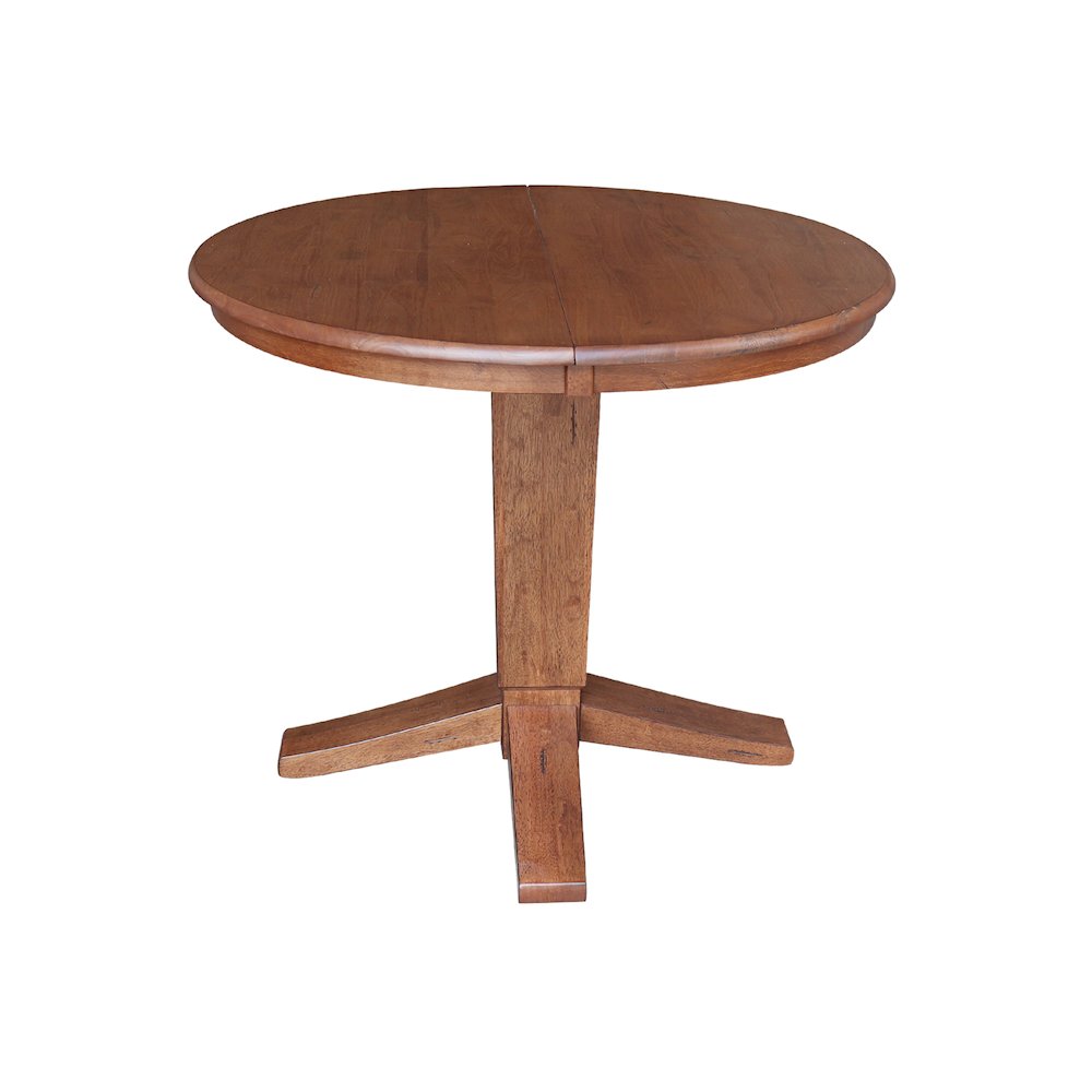 36 in Round Top Pedestal Dining Table with 12 in Leaf in Distressed Oak. Picture 4