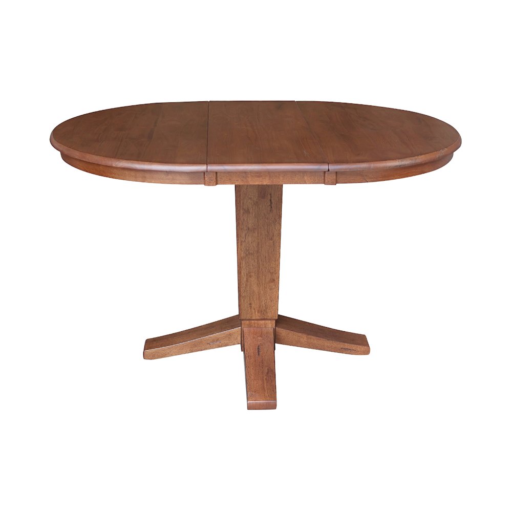 36 in Round Top Pedestal Dining Table with 12 in Leaf in Distressed Oak. Picture 3