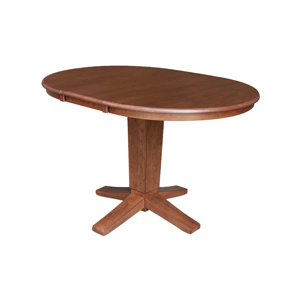 36 in Round Top Pedestal Dining Table with 12 in Leaf in Distressed Oak. Picture 9
