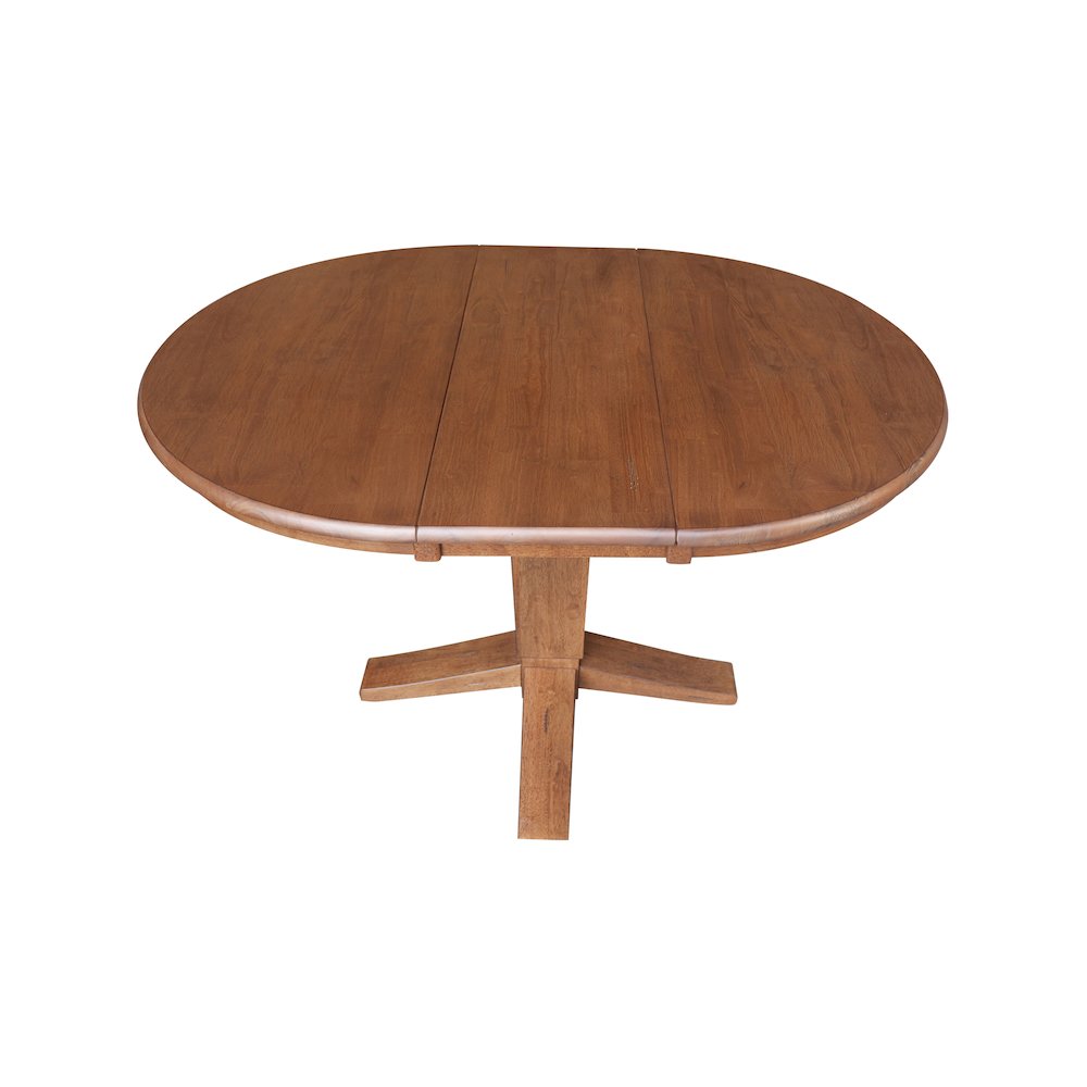 36 in Round Top Pedestal Dining Table with 12 in Leaf in Distressed Oak. Picture 10