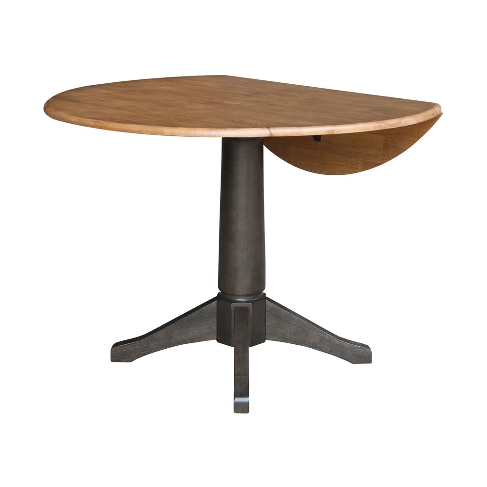 42 in. Round Top Dual Drop Leaf Pedestal Dining Table in Hickory/Washed Coal. Picture 4