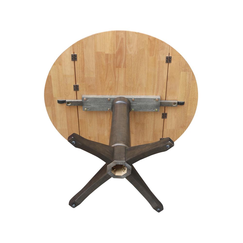 42 in. Round Top Dual Drop Leaf Pedestal Dining Table in Hickory/Washed Coal. Picture 7