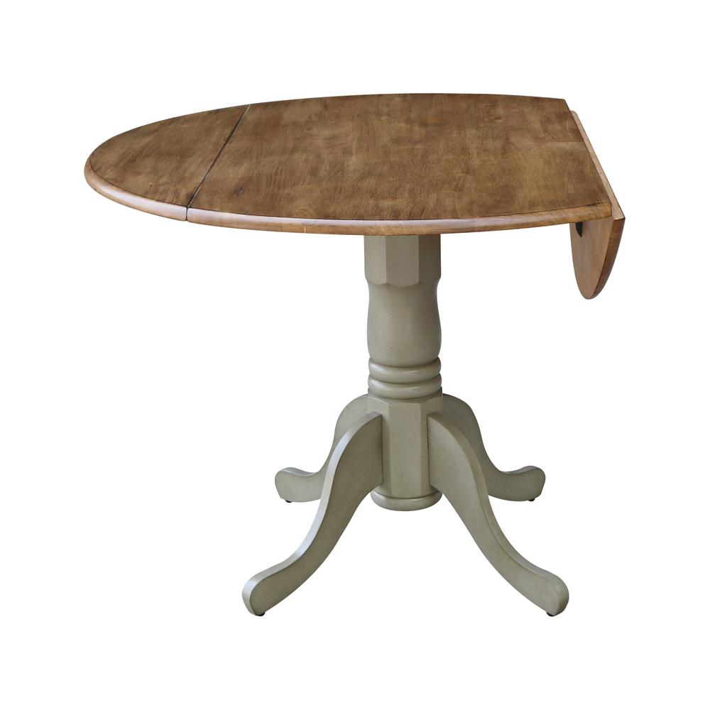 42" Round Dual Drop Leaf Pedestal Table. Picture 4