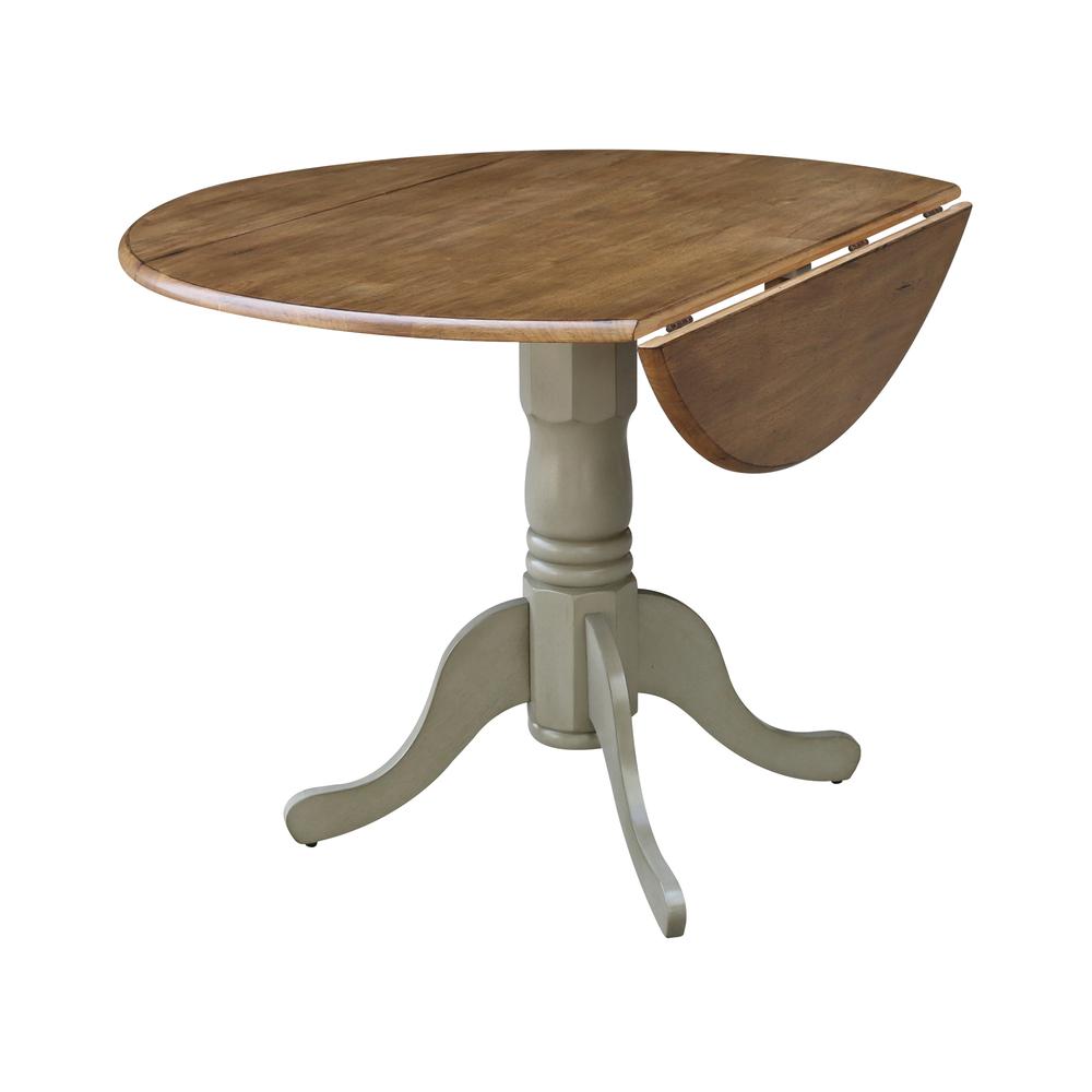 42" Round Dual Drop Leaf Pedestal Table. Picture 6