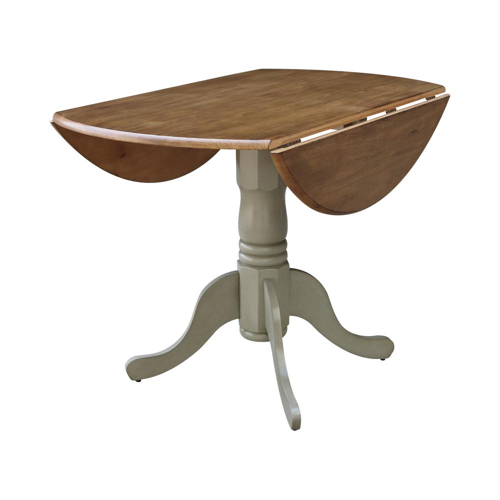 42" Round Dual Drop Leaf Pedestal Table. Picture 7