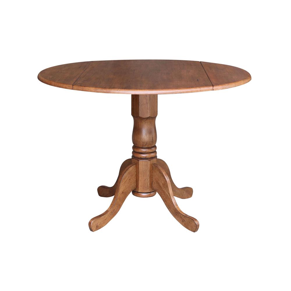 42" Round Dual Drop Leaf Pedestal Table. Picture 1