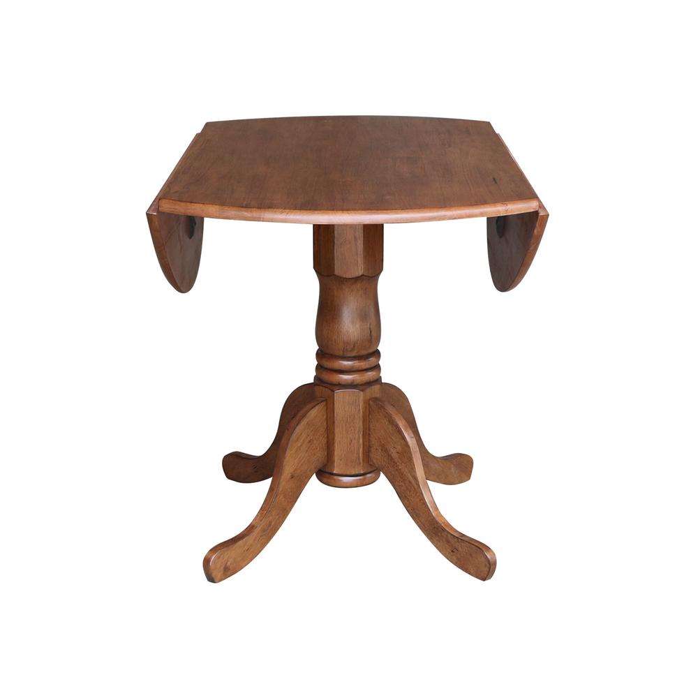 42" Round Dual Drop Leaf Pedestal Table. Picture 8