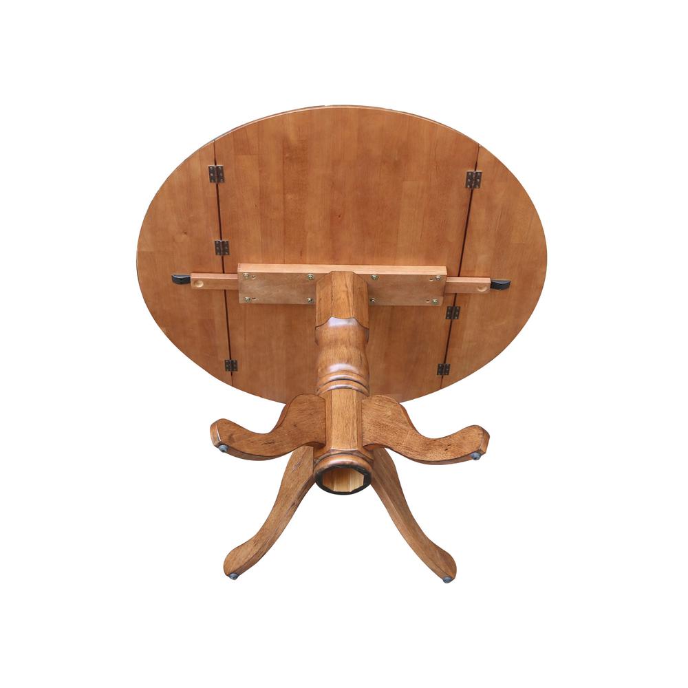 42" Round Dual Drop Leaf Pedestal Table. Picture 9