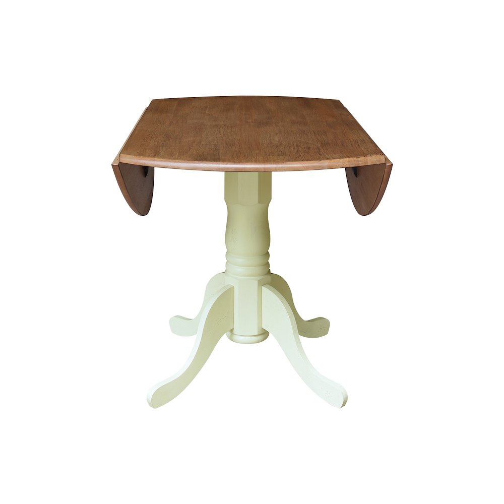 42" Round Dual Drop Leaf Pedestal Dining Table. Picture 3