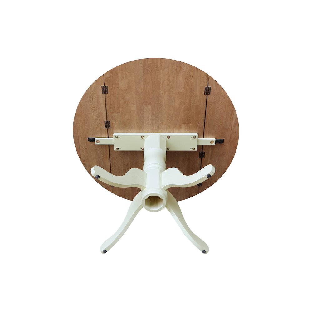42" Round Dual Drop Leaf Pedestal Dining Table. Picture 4