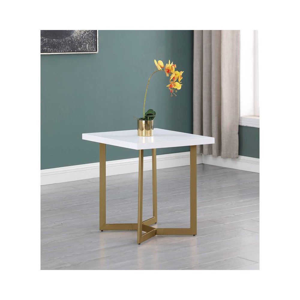 White wood top end table w/ gold color iron legs. Picture 2
