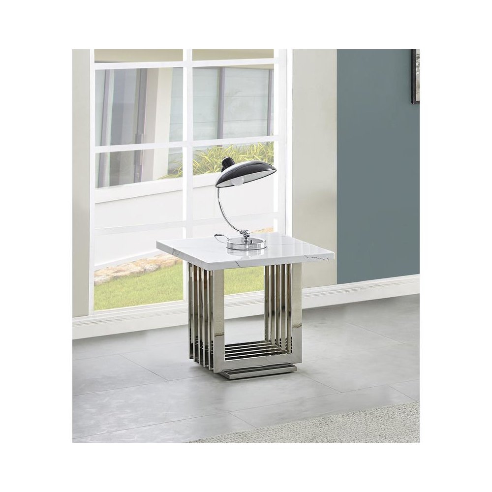 White marble top end table with a silver color stainless steel base. Picture 3