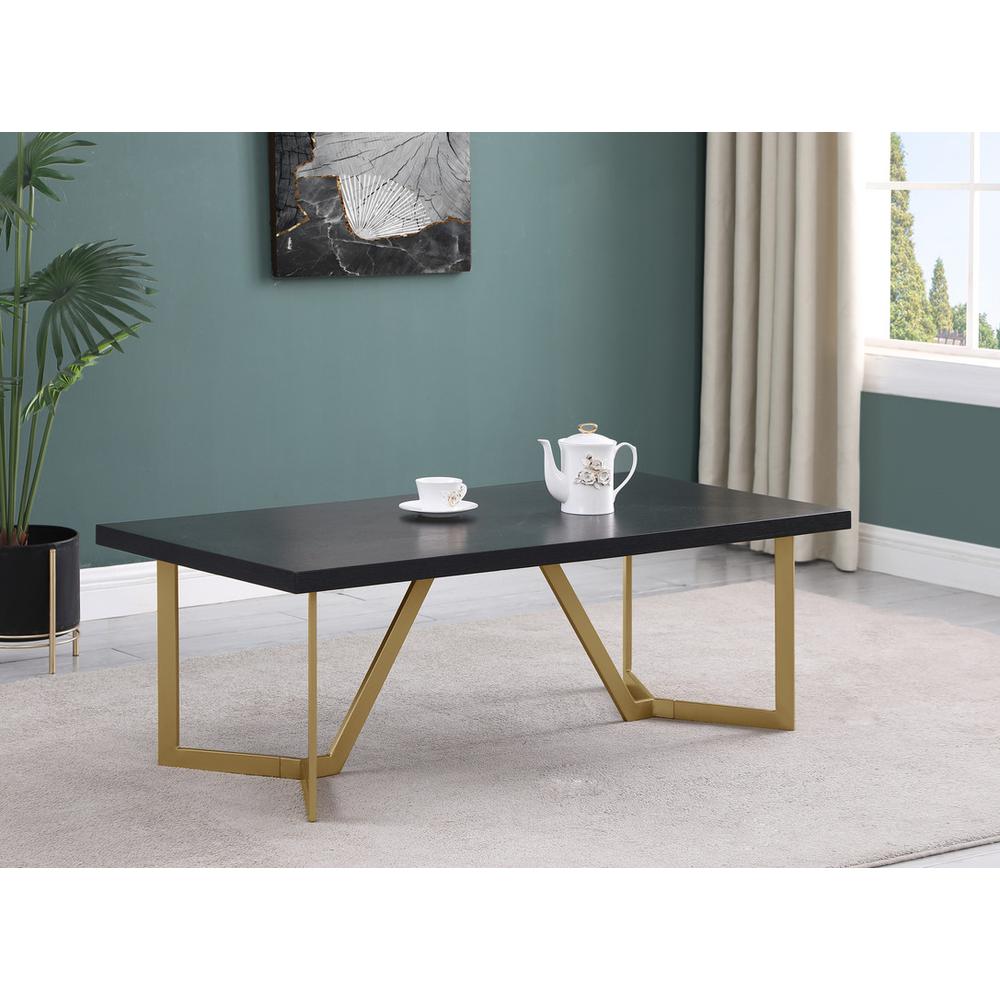 Black wood top coffee table w/ gold color iron legs. Picture 2