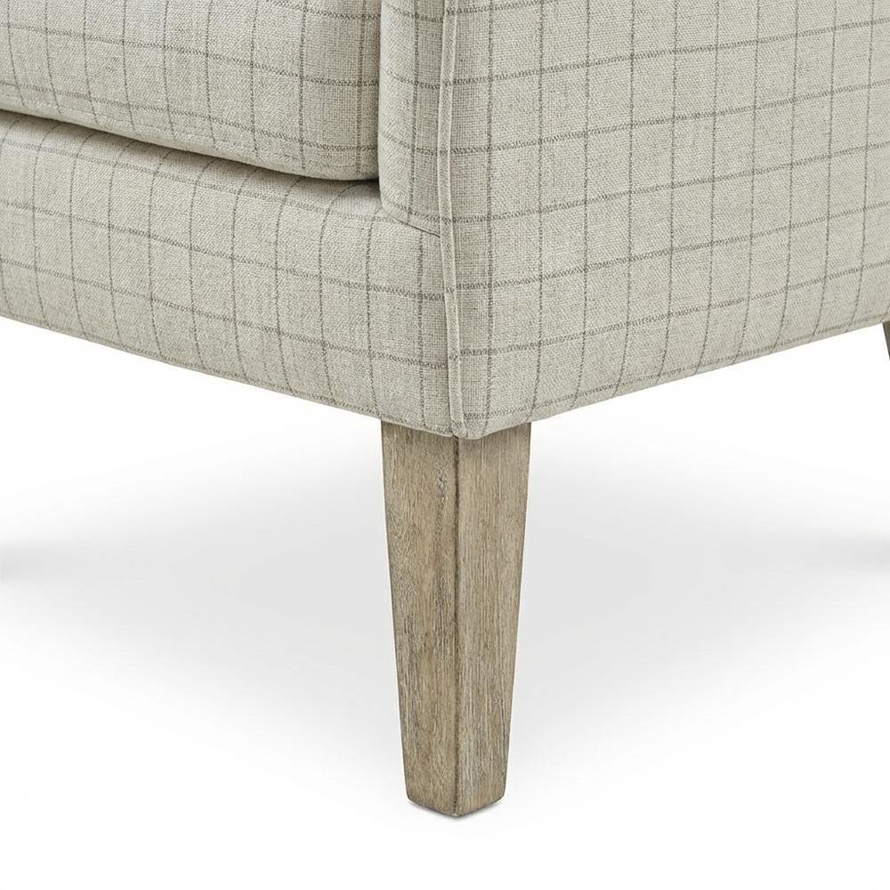 Beige Wing Chair with Stylish Design and Comfortable Upholstery. Picture 4