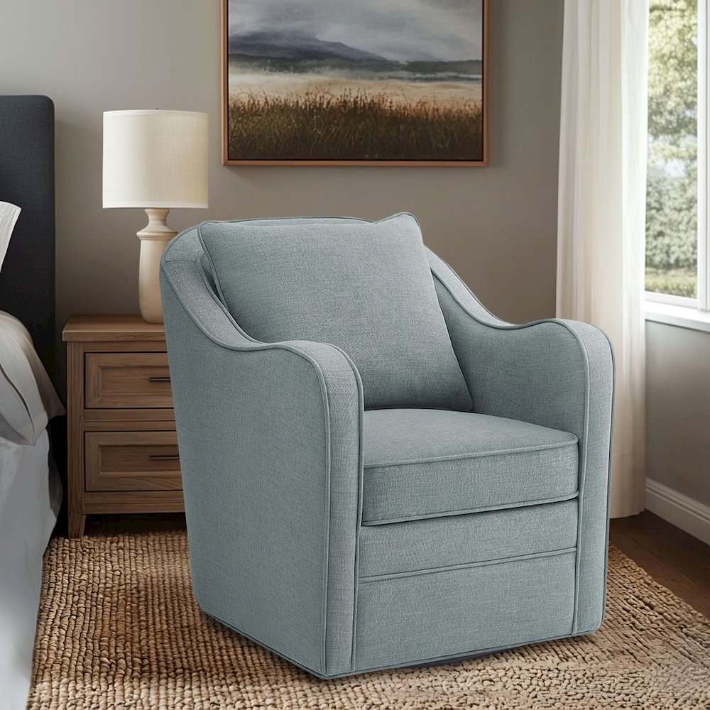 Brianne Upholstered Swivel Curved Armchair. Picture 1