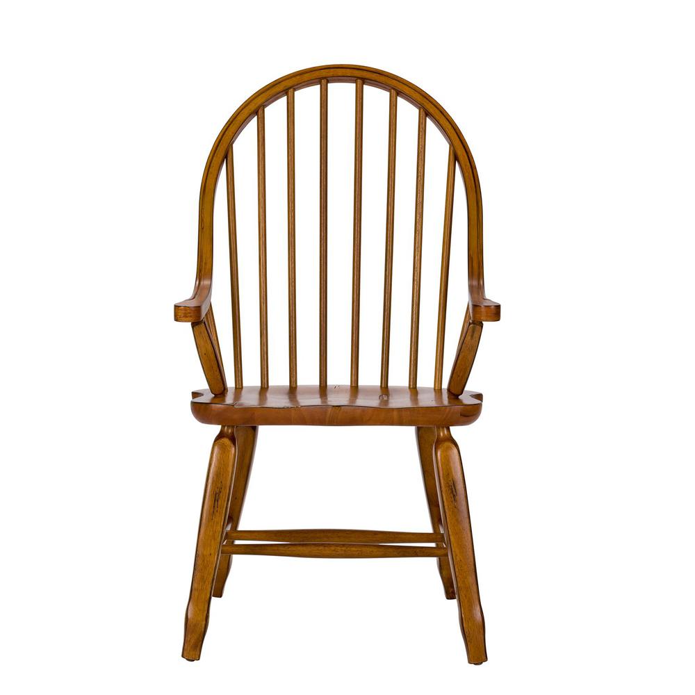 Treasures Bow Back Arm Chair - Oak in Rustic Oak. Picture 2