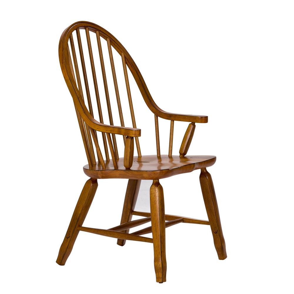 Treasures Bow Back Arm Chair - Oak in Rustic Oak. Picture 3