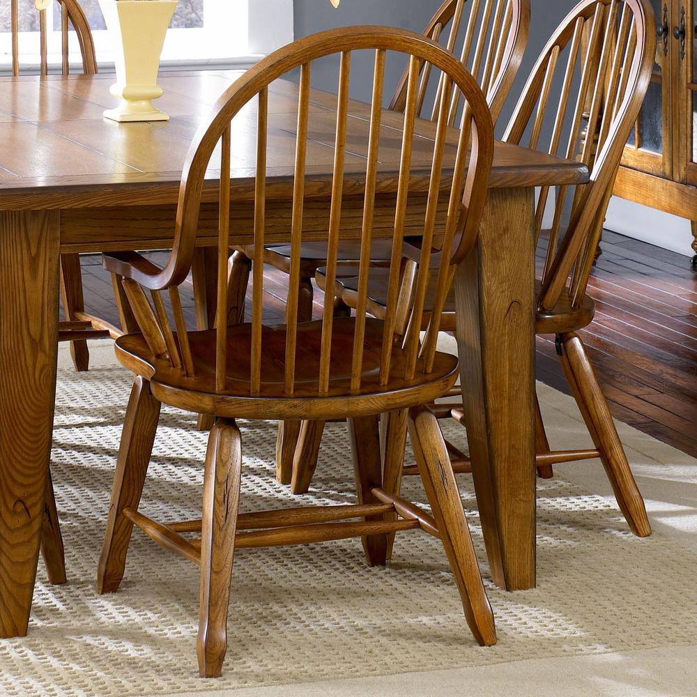 Treasures Bow Back Arm Chair - Oak in Rustic Oak. Picture 7