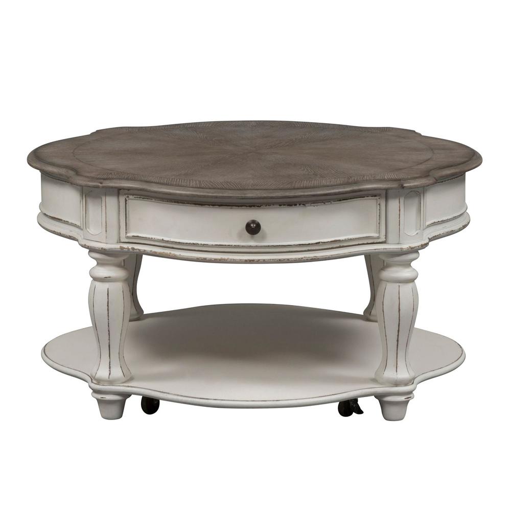 Magnolia Manor Round Cocktail Table in Antique White. Picture 1