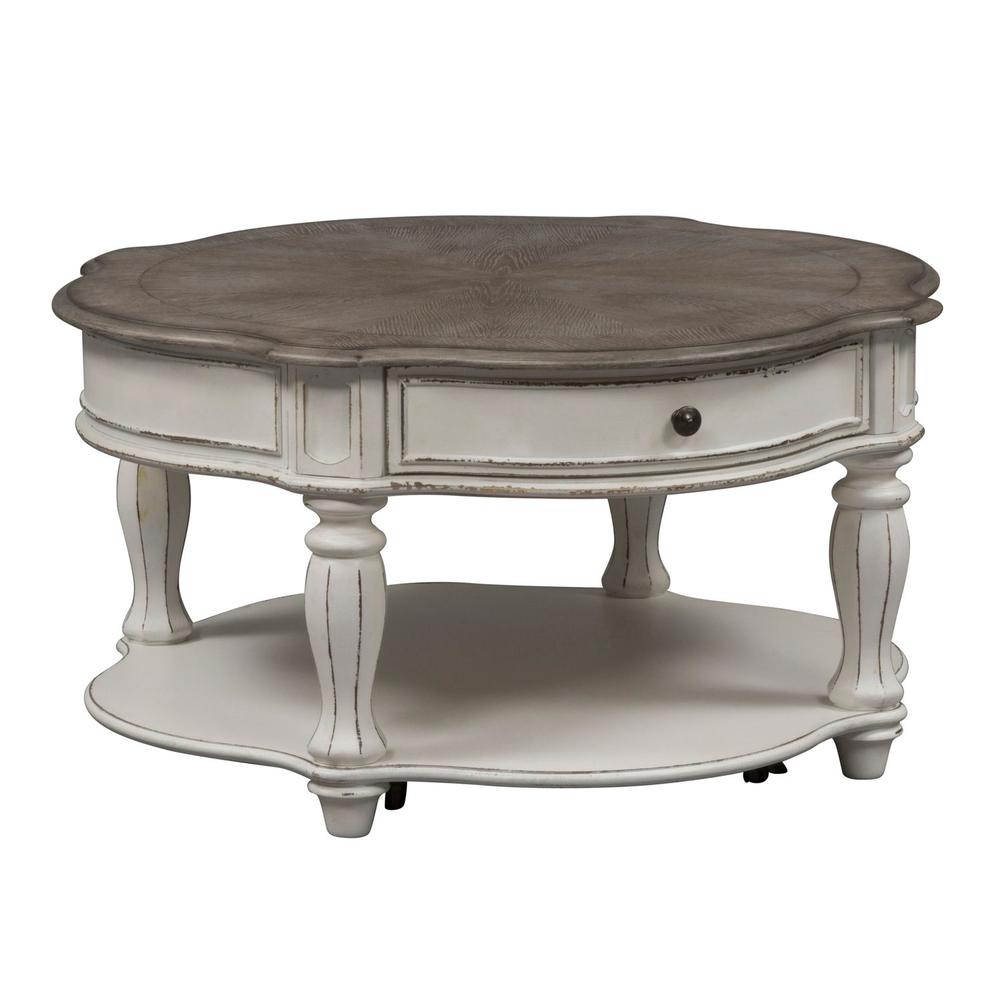 Magnolia Manor Round Cocktail Table in Antique White. Picture 2