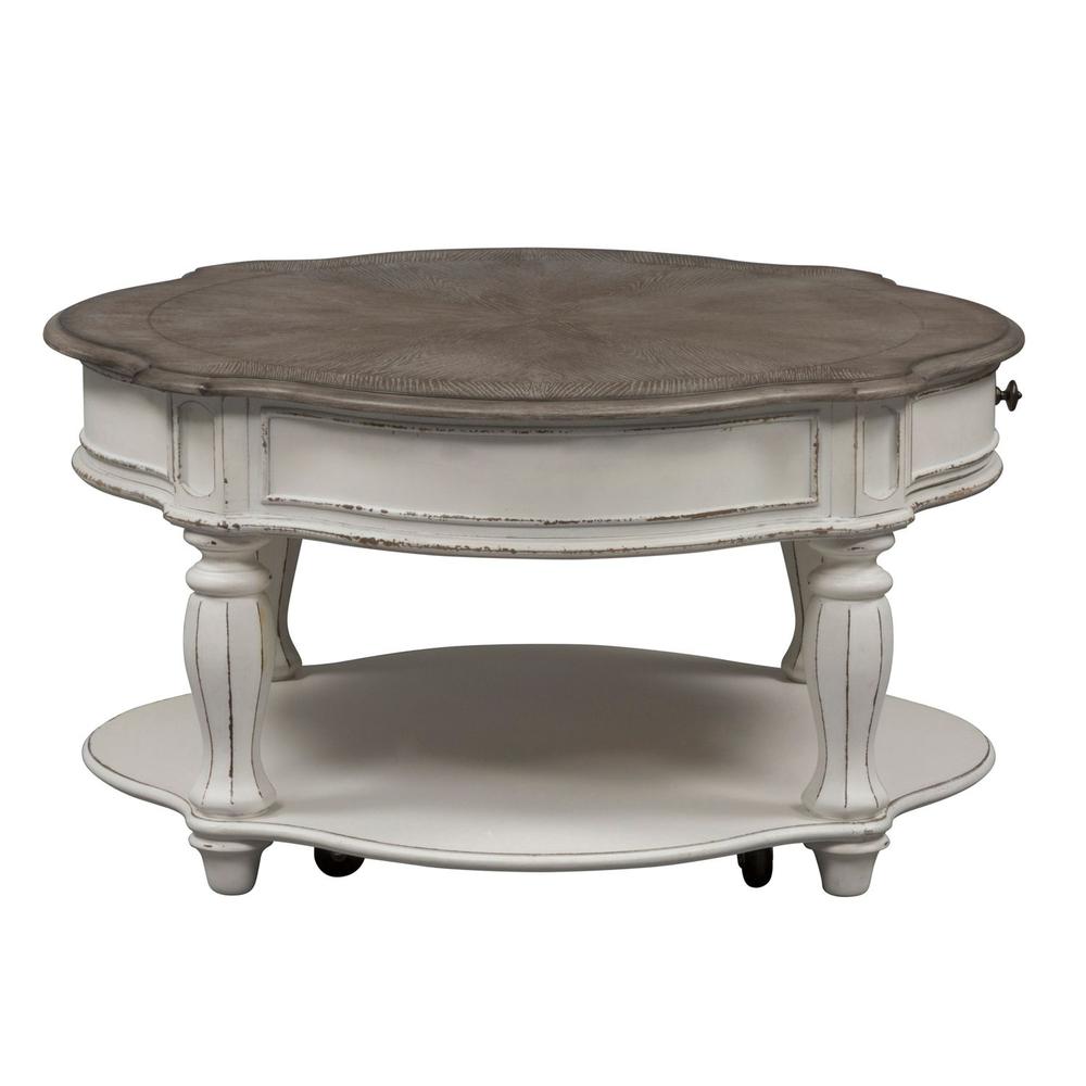 Magnolia Manor Round Cocktail Table in Antique White. Picture 3