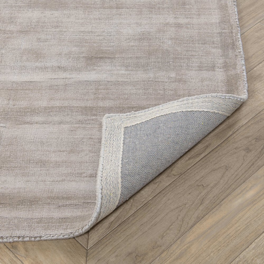 Cameron Hand-woven Distressed Viscose Area Rug by Kosas Home. Picture 3