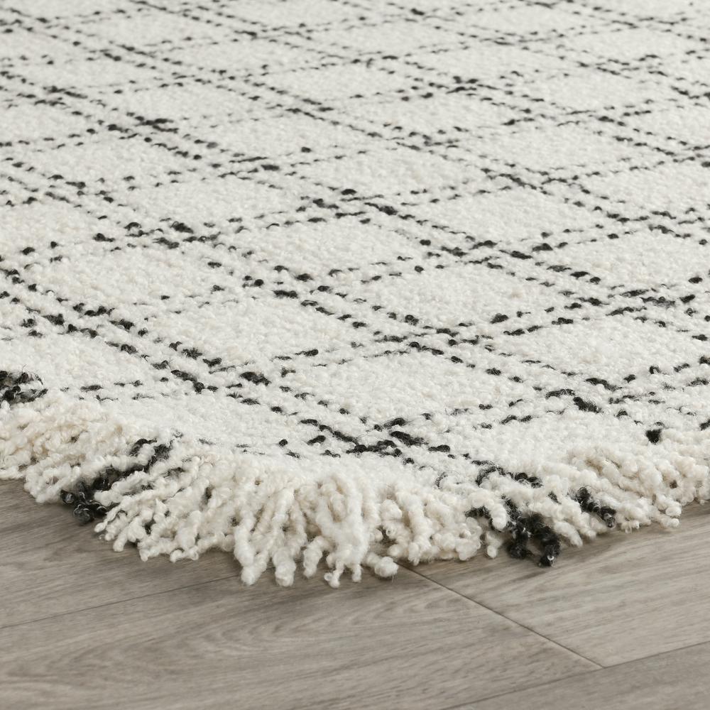 Bradbury Checkered Wool Area Rug by Kosas Home. Picture 3