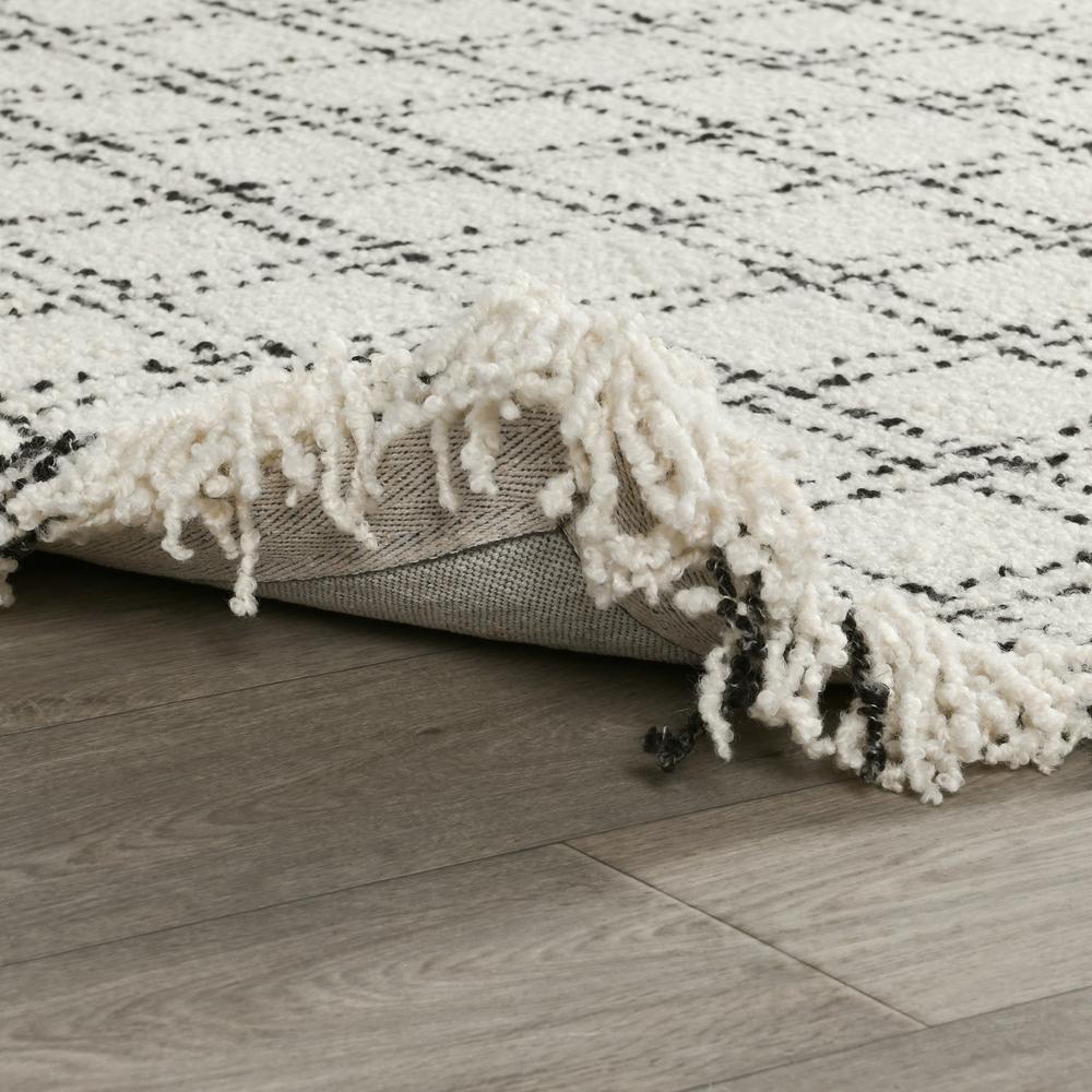 Bradbury Checkered Wool Area Rug by Kosas Home. Picture 4