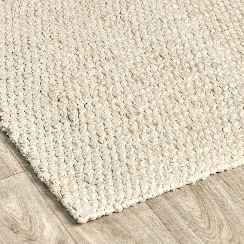 Santa Cruz 5'x8' Jute Handwoven Sustainable Ivory Accent Area Rug. Picture 3