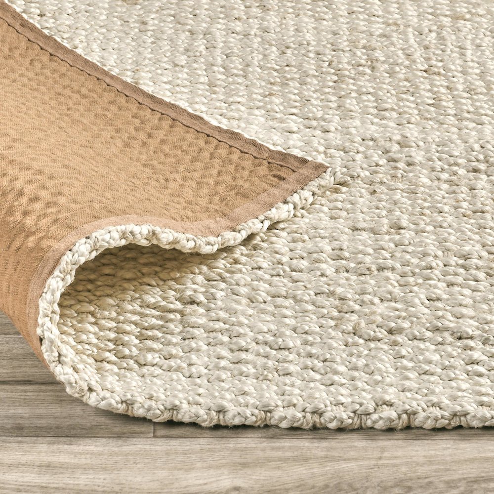 Santa Cruz 5'x8' Jute Handwoven Sustainable Ivory Accent Area Rug. Picture 4