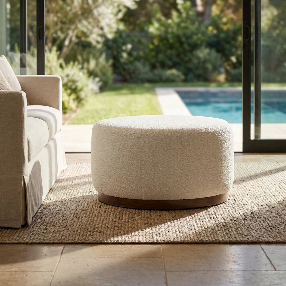 Dark beige boucle upholstered outdoor ottoman, versatile design, compact size. Picture 3