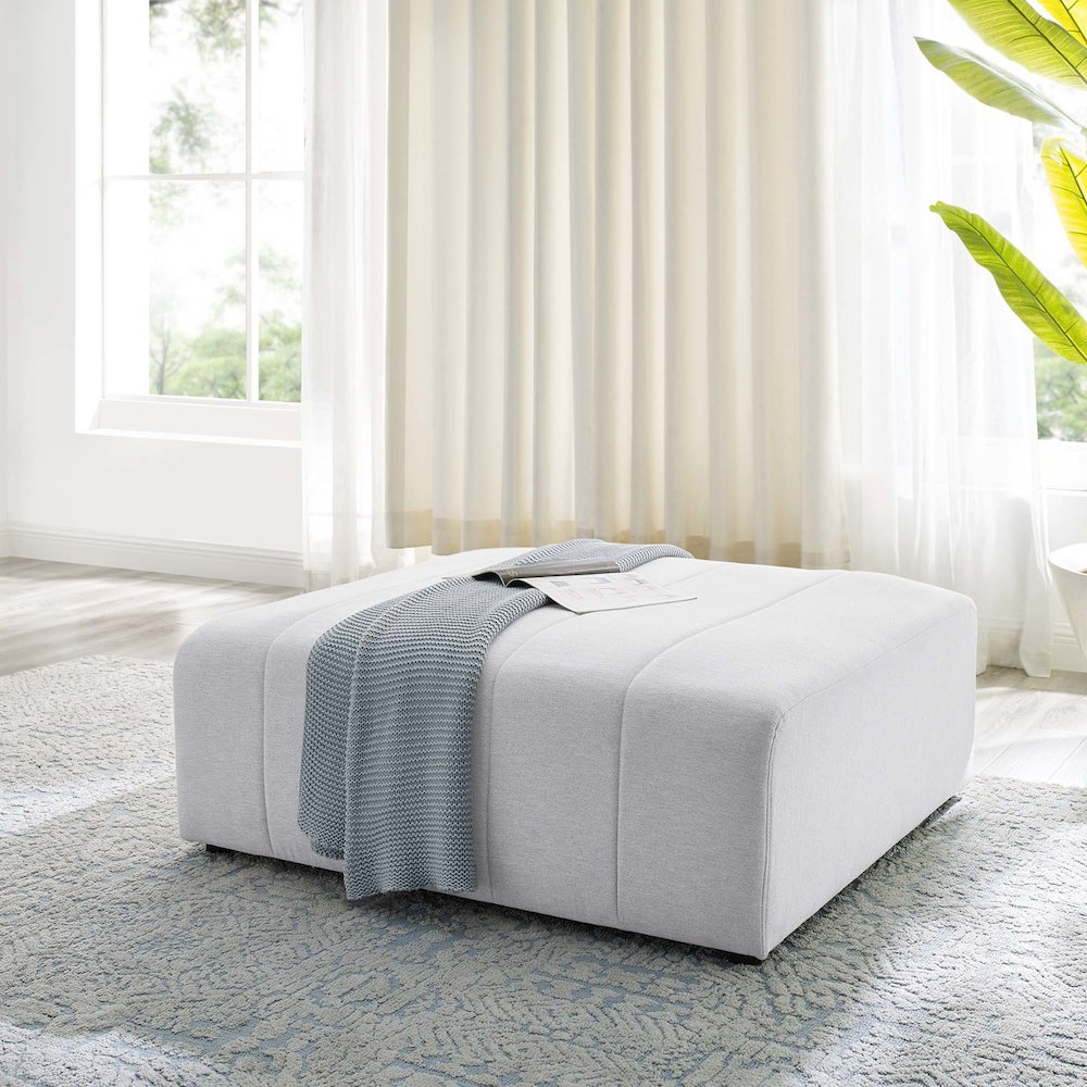 Bartlett Upholstered Fabric Ottoman. Picture 5