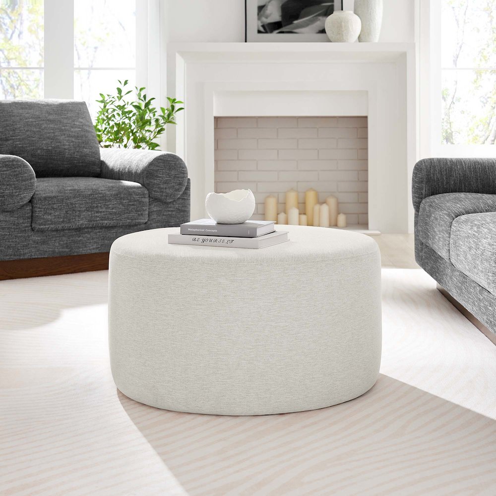 Callum Large 29" Round Woven Heathered Fabric Upholstered Ottoman. Picture 6