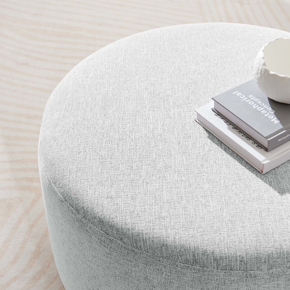 Callum Large 29" Round Woven Heathered Fabric Upholstered Ottoman. Picture 7