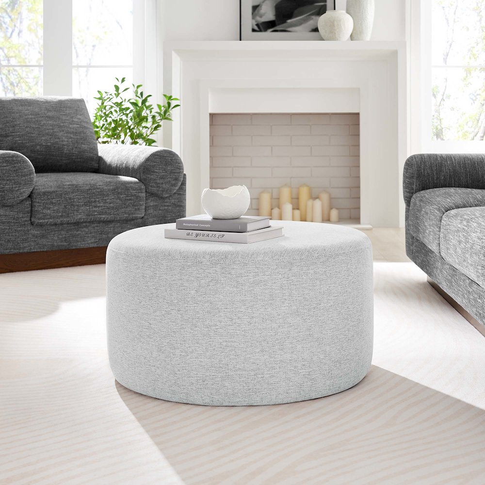 Callum Large 29" Round Woven Heathered Fabric Upholstered Ottoman. Picture 6