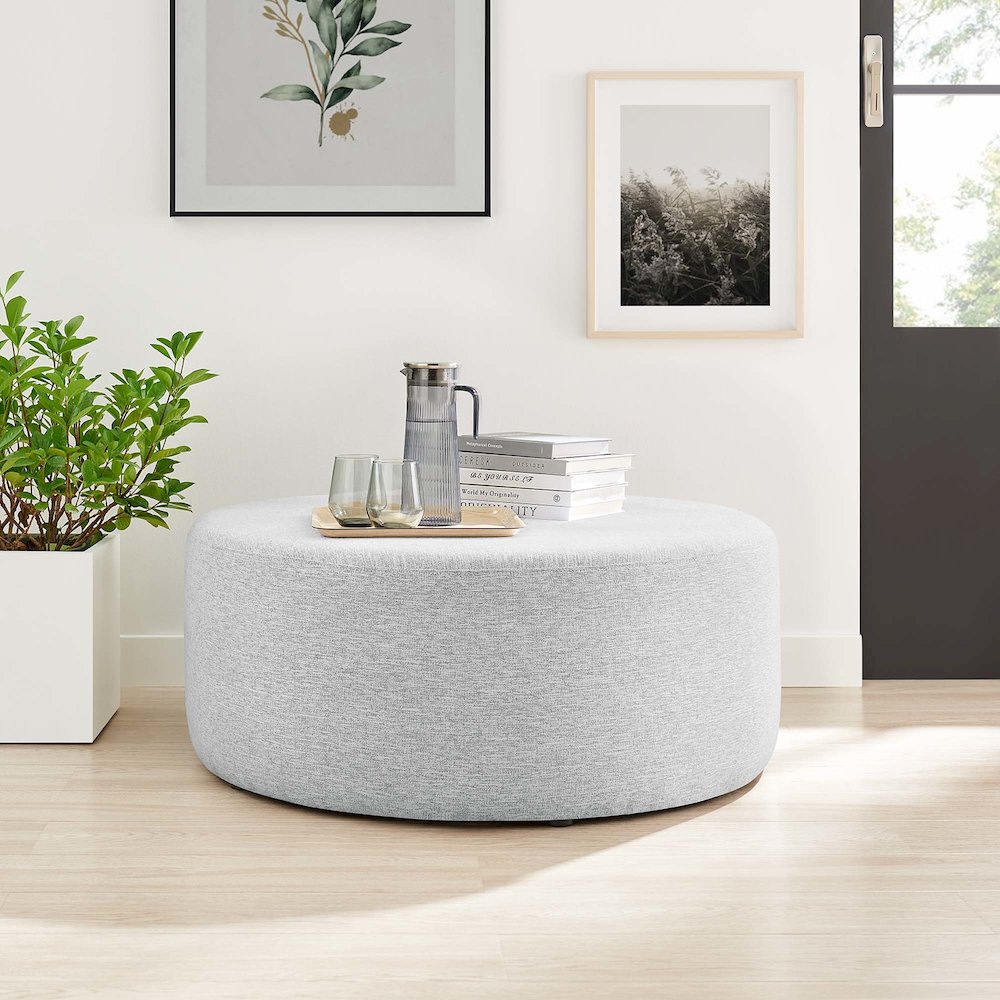 Callum Large 38" Round Woven Heathered Fabric Upholstered Ottoman. Picture 6