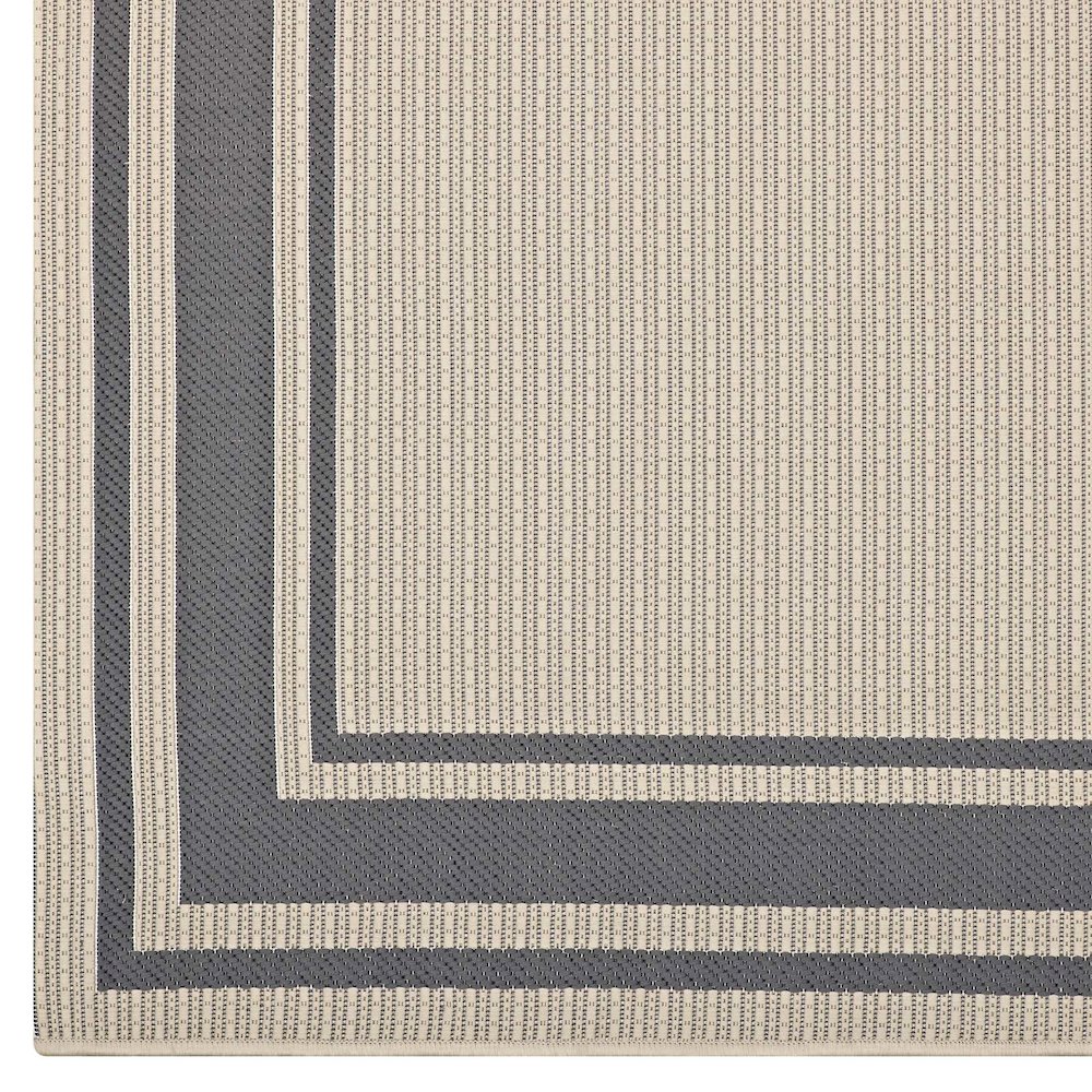 Rim Solid Border Indoor and Outdoor 5x8 Area Rug. Picture 2