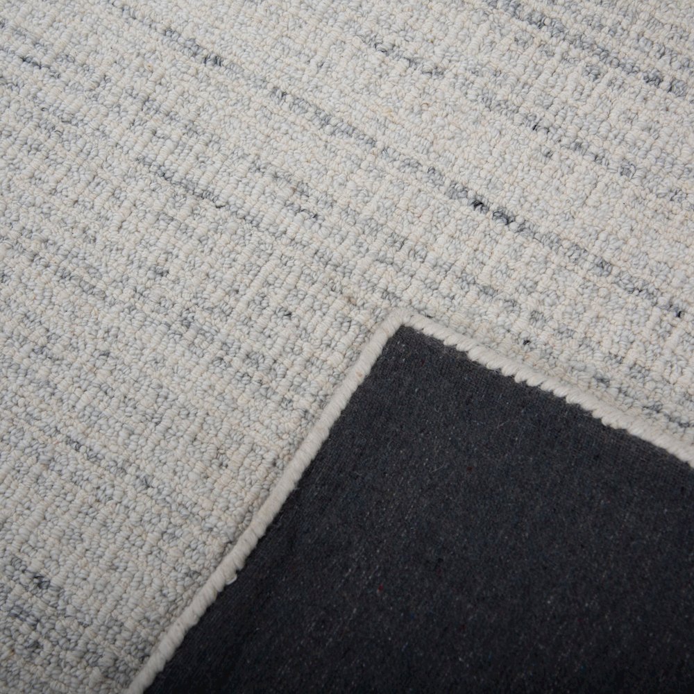 7'9" x 9'9" Loop Pile Hand Tufted Rug. Picture 2