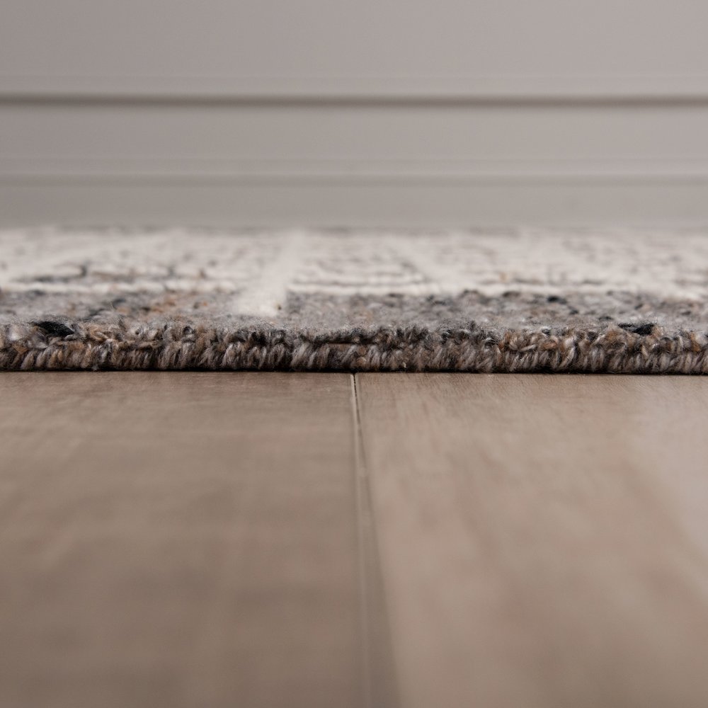 8'9" x 11'9" Loop Pile Hand Tufted Rug. Picture 4