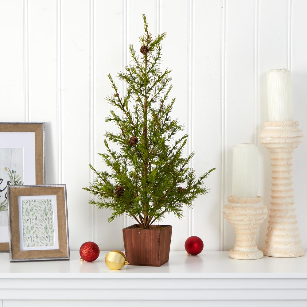 28in. Alpine Natural Look Artificial Christmas Tree in Wood Planter with Pine Cones. Picture 3
