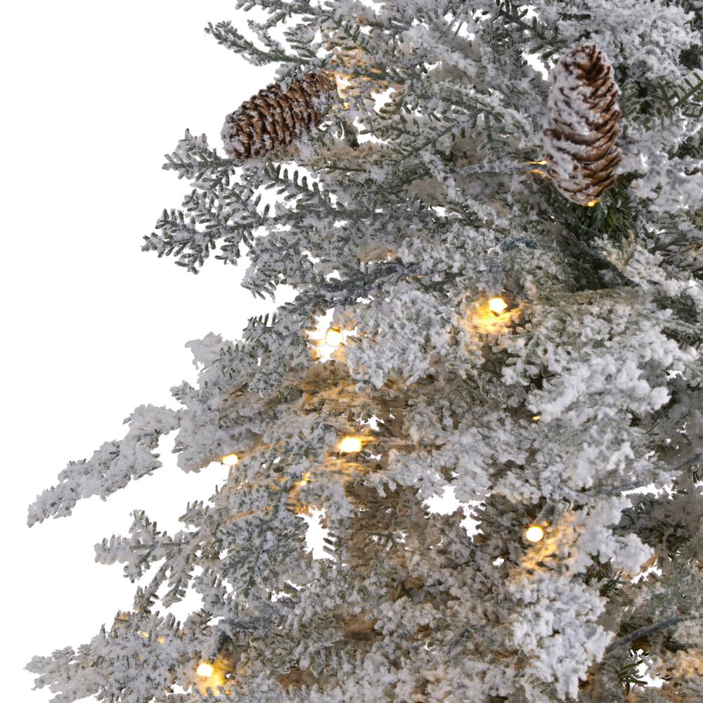 6ft. Flocked Montana Down Swept Spruce Artificial Christmas Tree. Picture 4