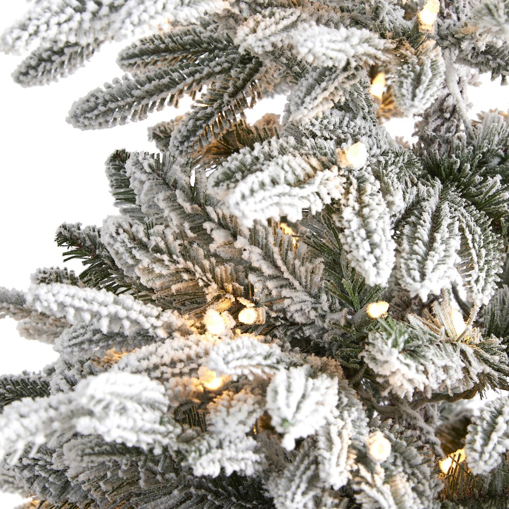 6.5ft. Flocked Manchester Spruce Artificial Christmas Tree with 300 Lights. Picture 3