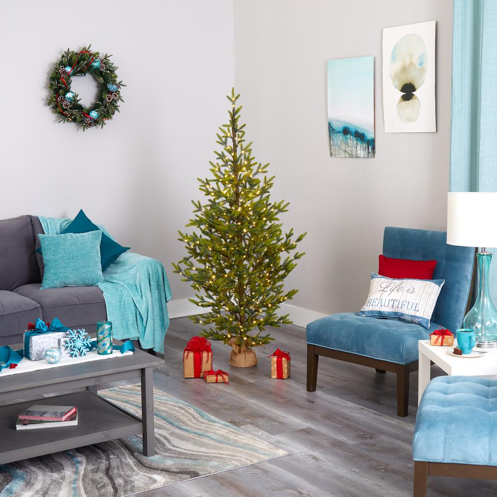 6ft. Fraser Fir Natural Look Artificial Christmas Tree with 250 Clear LED Lights, a Burlap Base and 1243 Bendable Branches. Picture 5