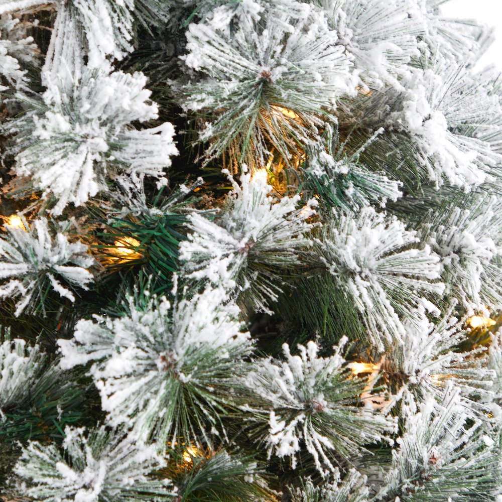 56in. Flocked Oregon Pine Christmas Tree with 100 Clear Lights in Decorative Urn. Picture 4