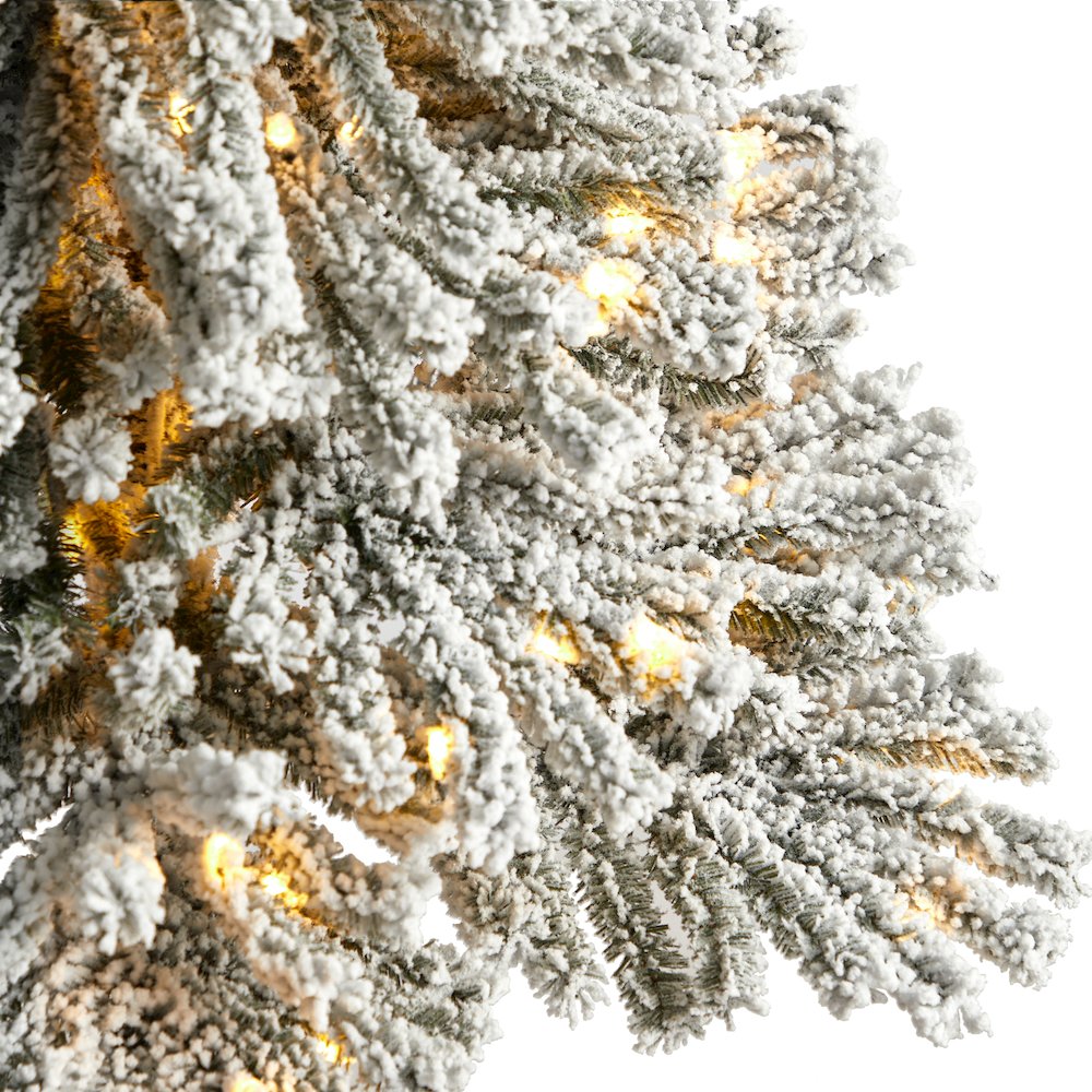 5ft. Winter Flocked Leaning Christmas Tree Pre-Lit with 150 LEDs in Planter. Picture 4