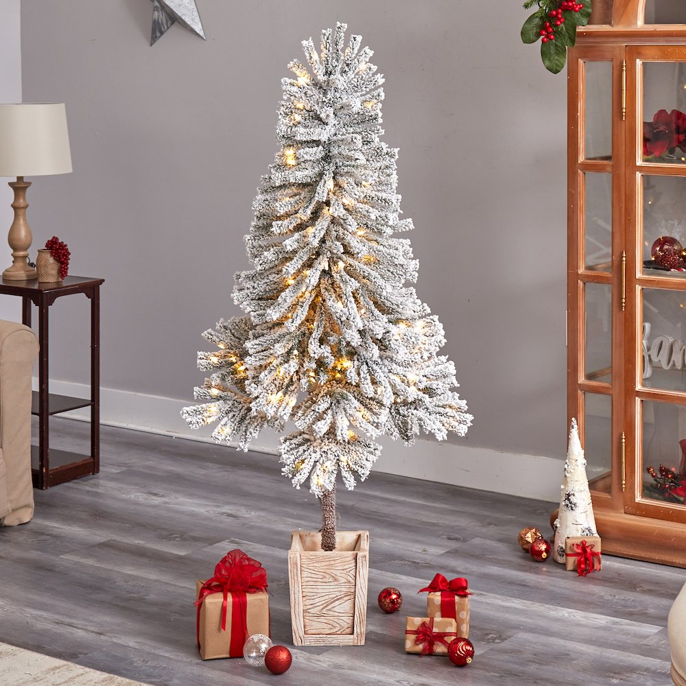 5ft. Winter Flocked Leaning Christmas Tree Pre-Lit with 150 LEDs in Planter. Picture 7