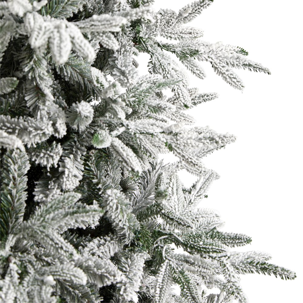 9.5ft. Flocked Manchester Spruce Artificial Christmas Tree with 650 Lights. Picture 5